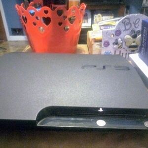 PS3 Slim 160gb Console with Cord/ HDMI!! Work Powers On& 2 DvD's  'Sold As Is'!